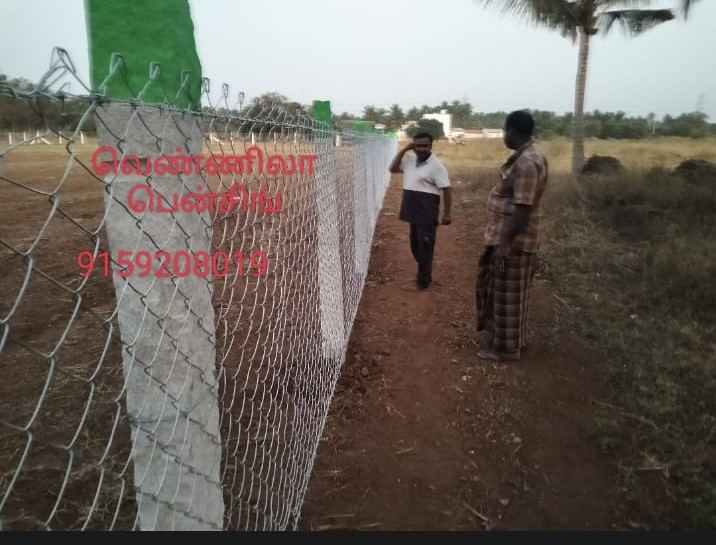 Vennila Fencing team inspecting a completed chain-link fence line